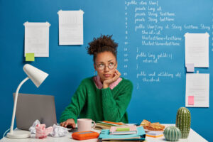 student planning study timetable with daily routine and weekly study schedule for exams